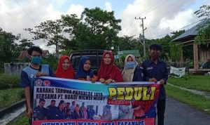 Huadi Peduli Melalui Karang Taruna Desa Papanloe Bagikan Paket Sembako ke Warga