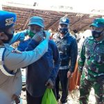 Personil Gabungan Pemerintah Kecamatan Amali di Back Up TNI-Polri Disiplinkan Protokol Kesehatan di Pasar